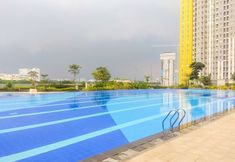 Swimming Pool 6 Studio Apartment with Mall View at The Springlake View Summarecon By Travelio