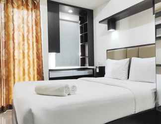 Kamar Tidur 2 Cozy and Chic Studio at Vida View Apartment By Travelio