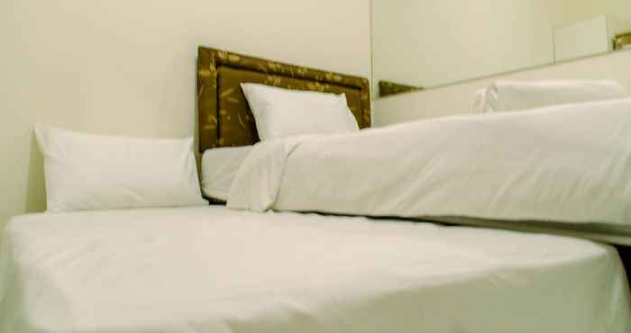 Kamar Tidur Comfy Studio Apartment near Soetta at Aeropolis Residence By Travelio