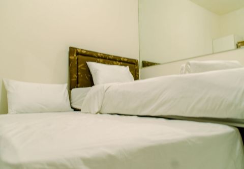 Bedroom Comfy Studio Apartment near Soetta at Aeropolis Residence By Travelio