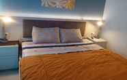 Kamar Tidur 2 Treepark City Apartemen by KitaRooms