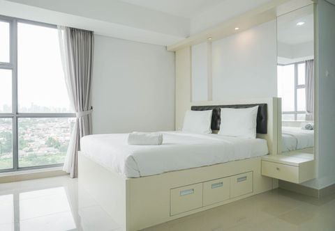Bedroom Cozy and Warm 3BR Apartment at The Royal Olive Residence By Travelio