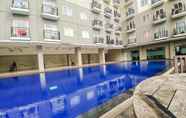 Swimming Pool 7 Cozy Living Studio Apartment at Sunter Park View By Travelio