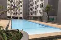 Swimming Pool Cozy & Stylish Studio Apartment at Jarrdin Cihampelas By Travelio