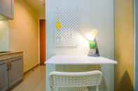 Common Space Cozy and Warm Studio Evenciio Apartment Margonda near UI By Travelio