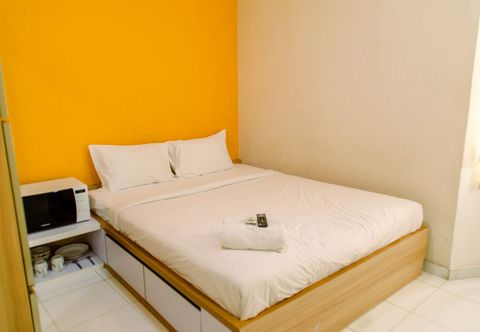 臥室 Cozy Living Studio at Aeropolis Residence Apartment By Travelio