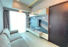 Common Space 4 Pleasant 2BR at Tamansari La Grande Apartment By Travelio