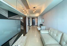 Lobby 3 Pleasant 2BR at Tamansari La Grande Apartment By Travelio