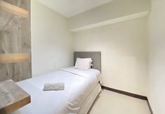 Bedroom 2 Pleasant 2BR at Tamansari La Grande Apartment By Travelio
