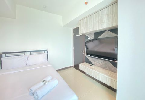 Bedroom Pleasant 2BR at Tamansari La Grande Apartment By Travelio