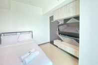 Bedroom Pleasant 2BR at Tamansari La Grande Apartment By Travelio