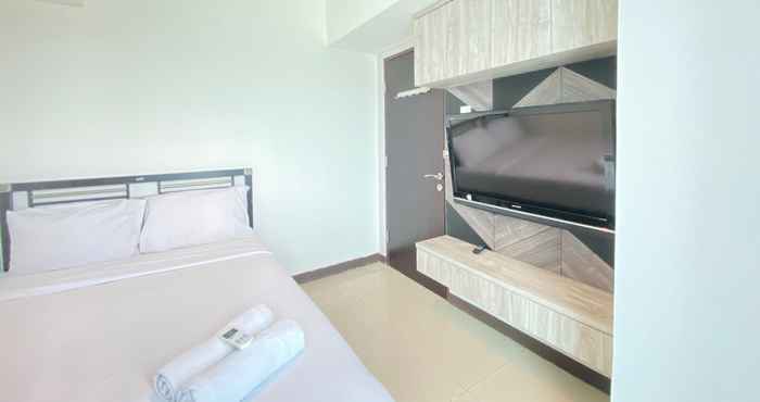 Bedroom Pleasant 2BR at Tamansari La Grande Apartment By Travelio