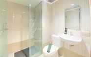 Toilet Kamar 6 Pleasant 2BR at Tamansari La Grande Apartment By Travelio