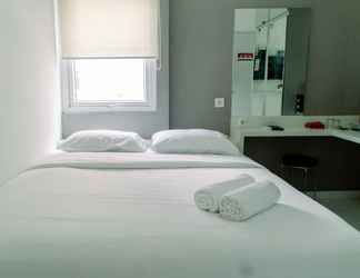 Bedroom 2 Nice Studio Apartment near CGK Airport at Aeropolis Residence By Travelio