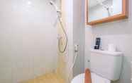 In-room Bathroom 4 Warm and Nice Studio at Taman Melati Apartment Margonda By Travelio