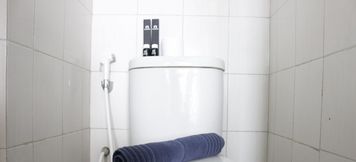 In-room Bathroom 4 Cozy Studio at Mekarwangi Square Cibaduyut Apartment By Travelio