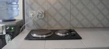 Common Space 3 Cozy Studio at Mekarwangi Square Cibaduyut Apartment By Travelio