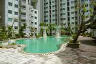 Swimming Pool Nice and Fancy 1BR at Sky Terrace Apartment By Travelio