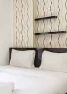 BEDROOM Scenic 2BR Apartment at Green Pramuka City near Mall By Travelio