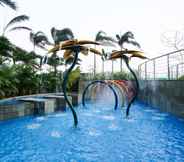 Swimming Pool 5 Super Good Choice For Studio Room Apartment at West Vista By Travelio