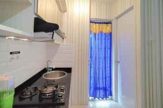 Common Space 4 Nice and Cozy Studio Apartment at Bassura City By Travelio