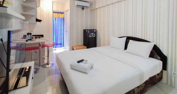 Bedroom Nice and Cozy Studio Apartment at Bassura City By Travelio