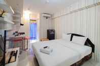 Bedroom Nice and Cozy Studio Apartment at Bassura City By Travelio