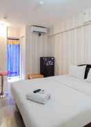 BEDROOM Nice and Cozy Studio Apartment at Bassura City By Travelio