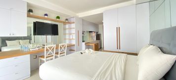 Lobby 2 Modern and Comfy Studio at Tamansari Tera Residence Apartment By Travelio