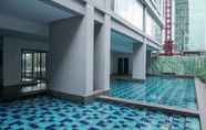 Swimming Pool 6 Attractive 1BR at Royal Olive Residence Apartment By Travelio