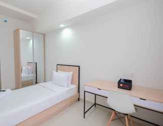 Bedroom 2 Comfort and Strategic Studio Apartment at Evenciio near Campus Area By Travelio