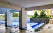 Swimming Pool 5 Best and Strategic Studio Apartment at Bassura By Travelio