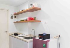 Common Space 3 Warm and Cozy Studio Apartment at Patraland Urbano By Travelio
