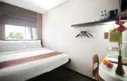 Bedroom 6 Favor Hotel Makassar City Center by LIFE