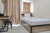 Bedroom Cozy and Best Deal Studio at Vida View Makasar Apartment By Travelio