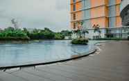 Swimming Pool 6 Fancy and Fabulous 1BR Apartment at Pejaten Park By Travelio