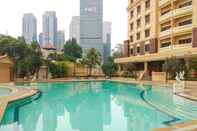 Swimming Pool Luxurious and Spacious 2BR Apartment at Kusuma Chandra By Travelio