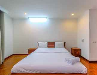 Bedroom 2 Luxurious and Spacious 2BR Apartment at Kusuma Chandra By Travelio