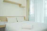 Kamar Tidur Comfy and Nice 1BR Apartment at Tree Park City BSD By Travelio