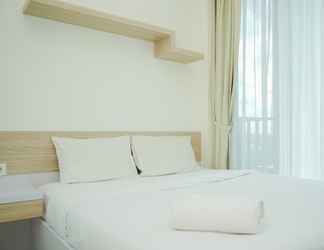 Kamar Tidur 2 Comfy and Nice 1BR Apartment at Tree Park City BSD By Travelio