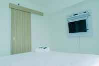 Common Space Stunning 1BR Apartment without Living Room at Bintaro Embarcadero Suites By Travelio