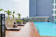 สระว่ายน้ำ Elegant 1BR Apartment without Living Room at Bintaro Embarcadero Suites By Travelio