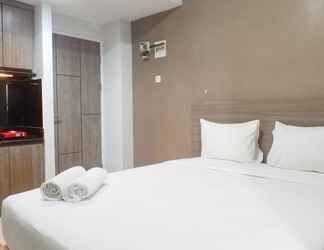 Bedroom 2 Delightful Luxurious Studio Room Apartment at Taman Melati Surabaya By Travelio