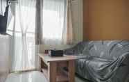 Common Space 3 Tidy and Restful 2BR at Green Pramuka City Apartment By Travelio