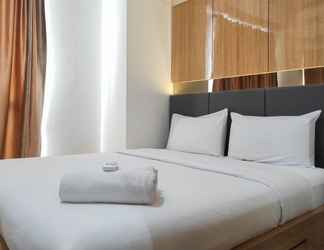 Bedroom 2 Spacious 2BR Apartment at Vida View Makassar By Travelio