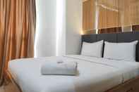 Bedroom Spacious 2BR Apartment at Vida View Makassar By Travelio