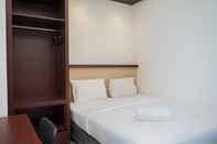 Kamar Tidur Nice and Comfy Studio at Tree Park City BSD Apartment By Travelio