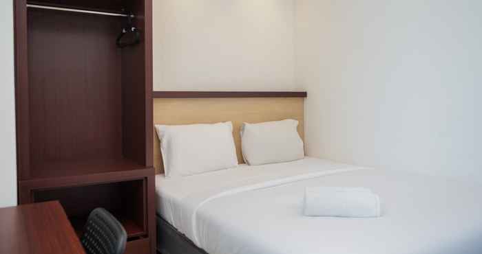 Kamar Tidur Nice and Comfy Studio at Tree Park City BSD Apartment By Travelio