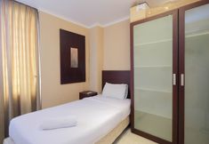 Bedroom 2 Homey and Nice 2BR Apartment at FX Residence By Travelio
