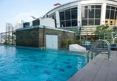 Swimming Pool 7 Homey and Nice 2BR Apartment at FX Residence By Travelio